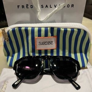 Sardine brand new sunglasses purchased at Freda Salvador this month.